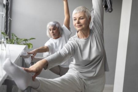 senior women doing fitness exercises gym